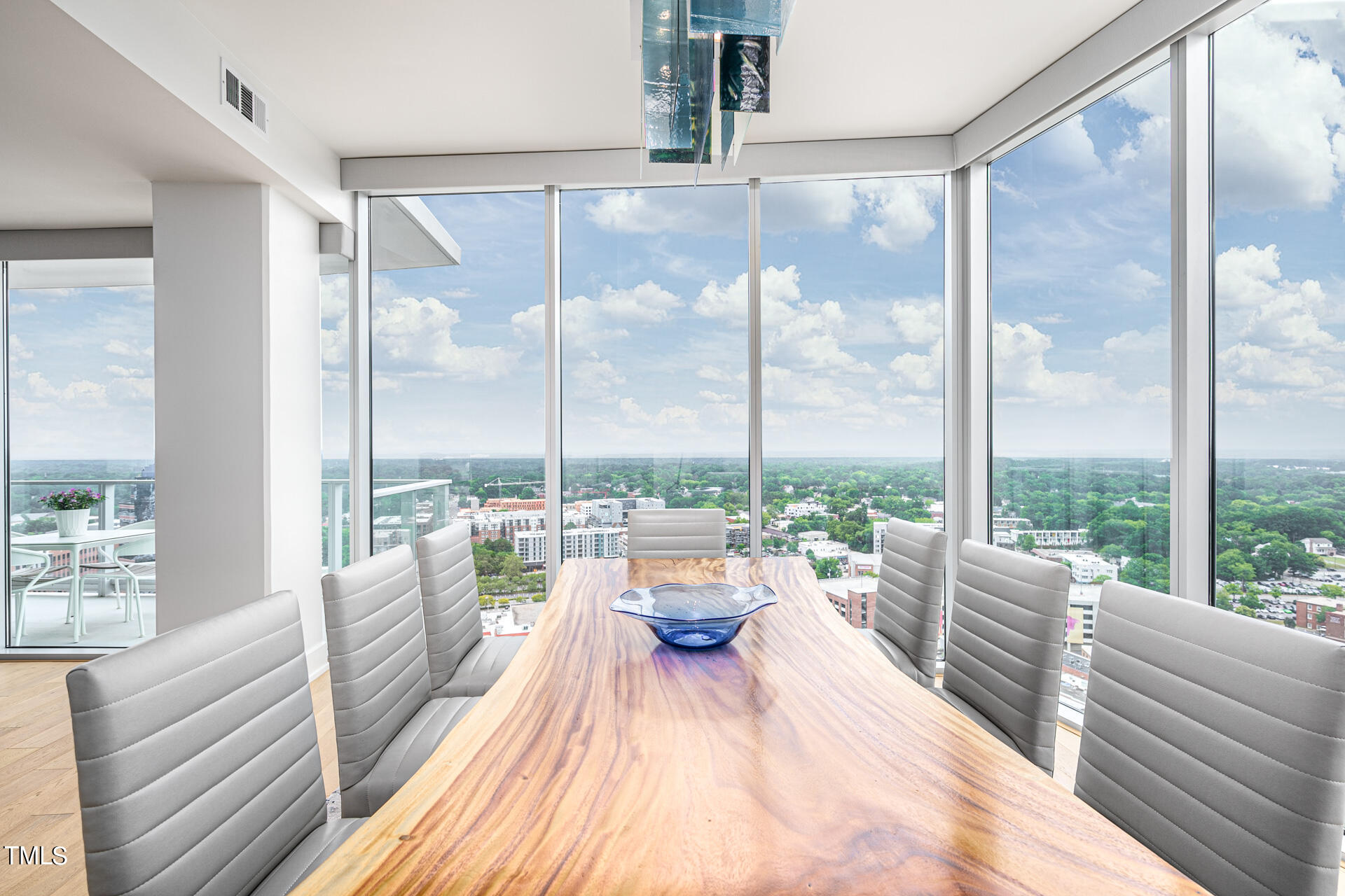 110 Corcoran Street, Unit 2301 Durham, NC 27701 - Photo 17 of 66 a view of a balcony with couch
