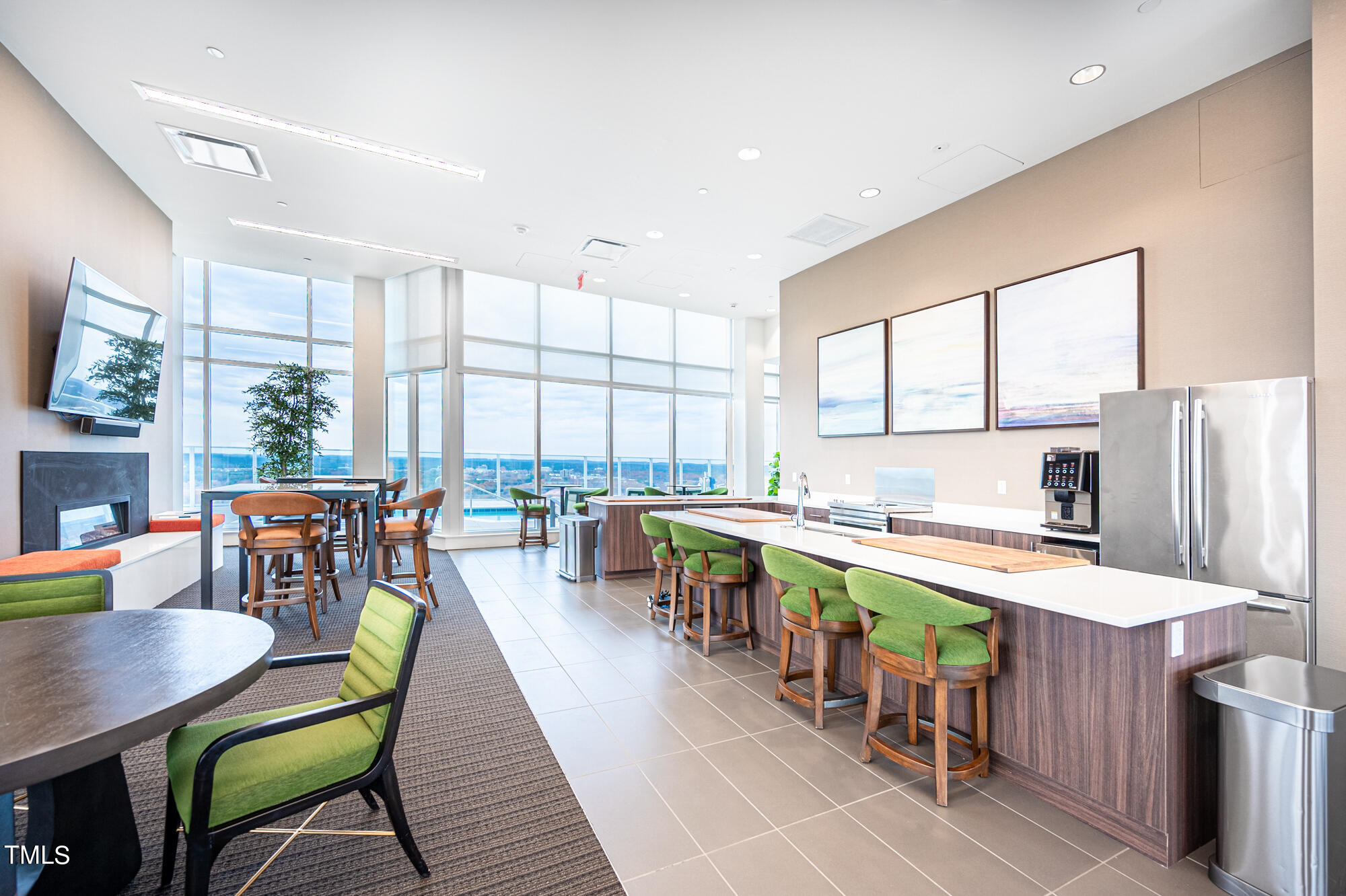 110 Corcoran Street, Unit 2301 Durham, NC 27701 - Photo 47 of 66 a kitchen with lots of wooden furniture appliances and a large window