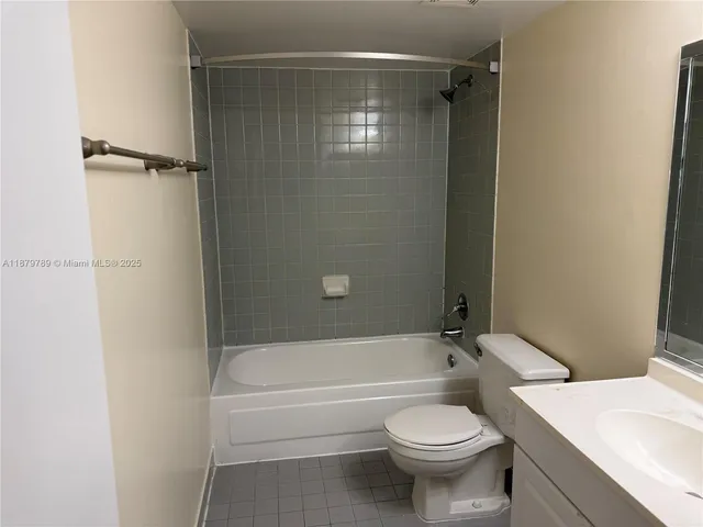 an empty room with large window