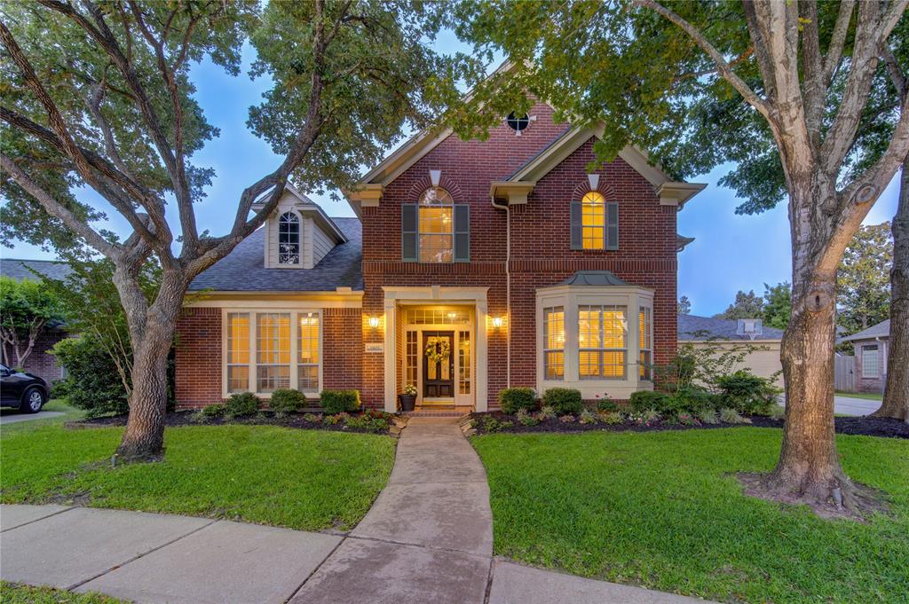 Welcome to 1907 Landon Point Circle, a truly stunning home nestled on a secluded cul-de-sac in the heart of Cinco Ranch.