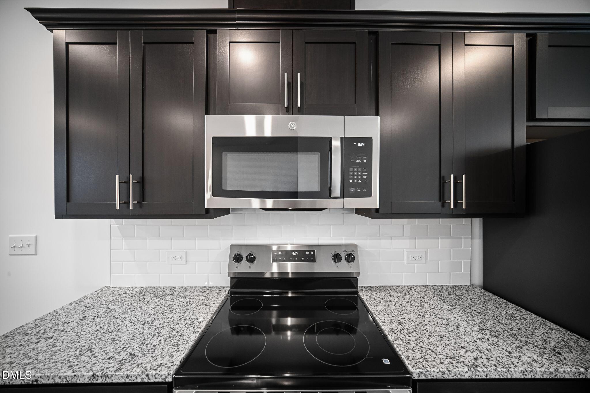 2302 Oakwood Mdws Court Raleigh, NC 27604 - Photo 8 of 28 SUN_ElmGrove_Pic_Jackson_QMI_19_Kitchen_