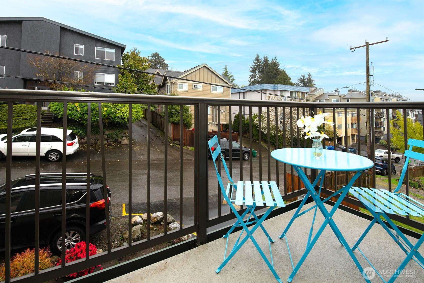 8747 Phinney Avenue North, Unit 13 Seattle, WA 98103 - Photo 25 of 32 a view of a balcony with chairs
