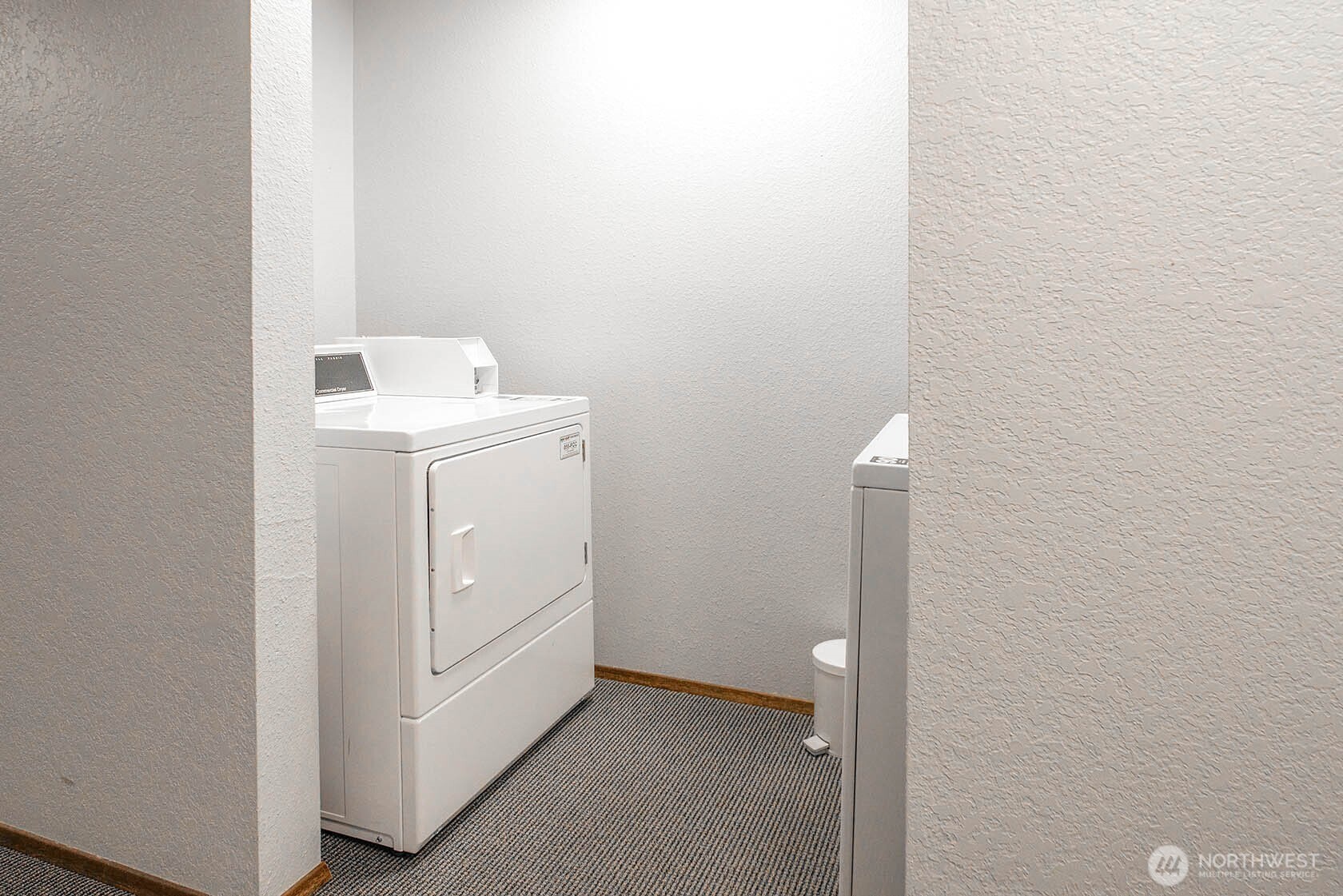 8747 Phinney Avenue North, Unit 13 Seattle, WA 98103 - Photo 27 of 32 a utility room with dryer and washer