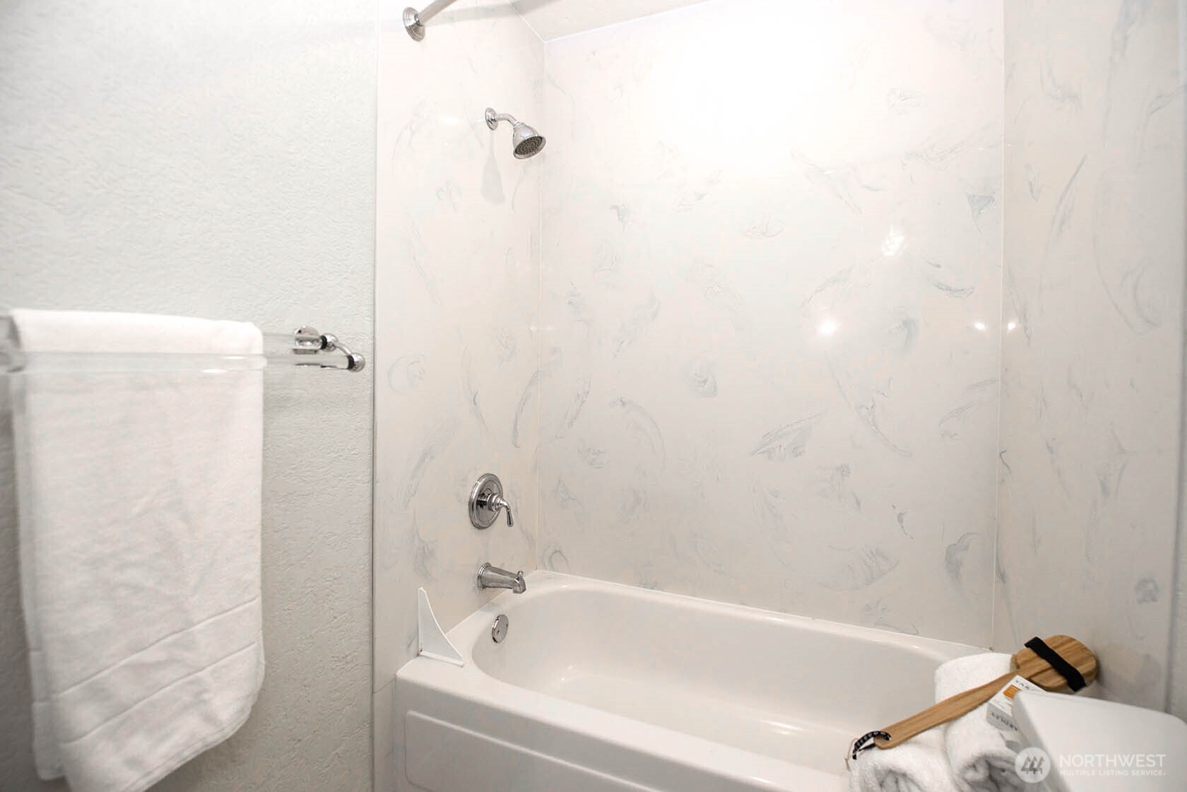 8747 Phinney Avenue North, Unit 13 Seattle, WA 98103 - Photo 6 of 32 a bathroom with a bathtub