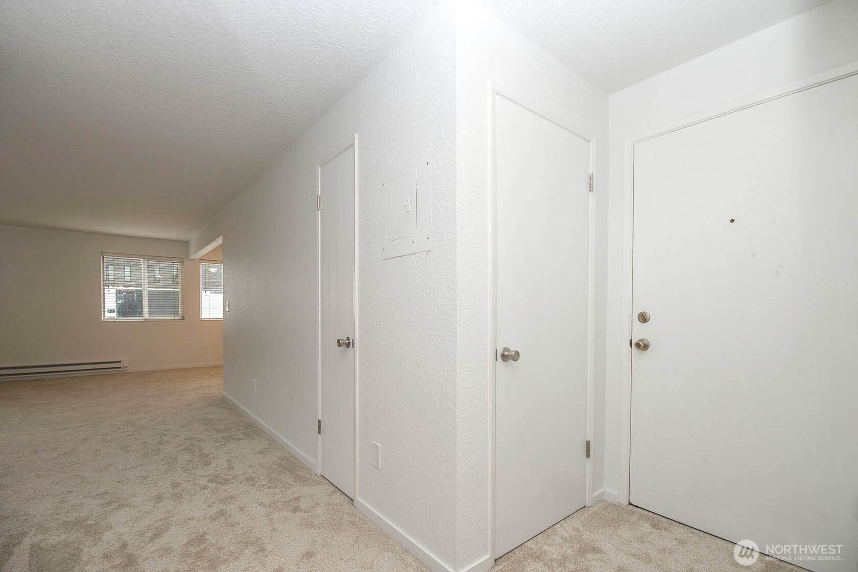 8747 Phinney Avenue North, Unit 13 Seattle, WA 98103 - Photo 10 of 32 a view of hallway with window