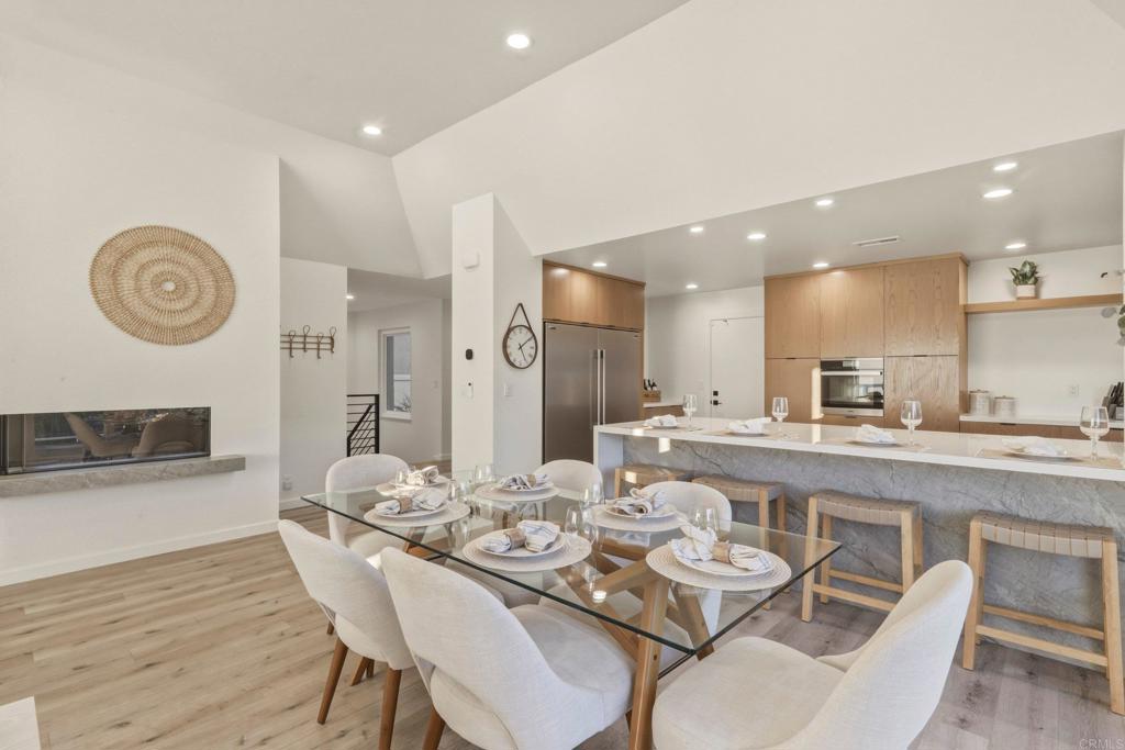 1712 Burgundy Road Encinitas, CA 92024 - Photo 12 of 31 a large kitchen with a table and chairs in it