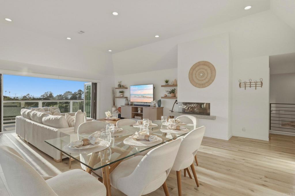 1712 Burgundy Road Encinitas, CA 92024 - Photo 2 of 31 a living room with furniture and wooden floor