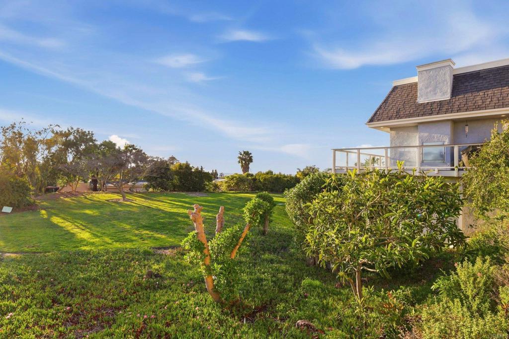 1712 Burgundy Road Encinitas, CA 92024 - Photo 25 of 31 a view of a house with a big yard