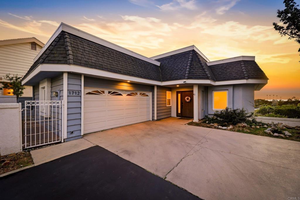 1712 Burgundy Road Encinitas, CA 92024 - Photo 28 of 31 a view of a house with large windows