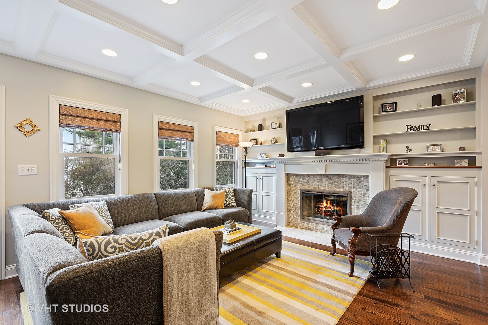 339 Maple Avenue Wilmette, IL 60091 - Photo 9 of 33 a living room with furniture fireplace and a flat screen tv