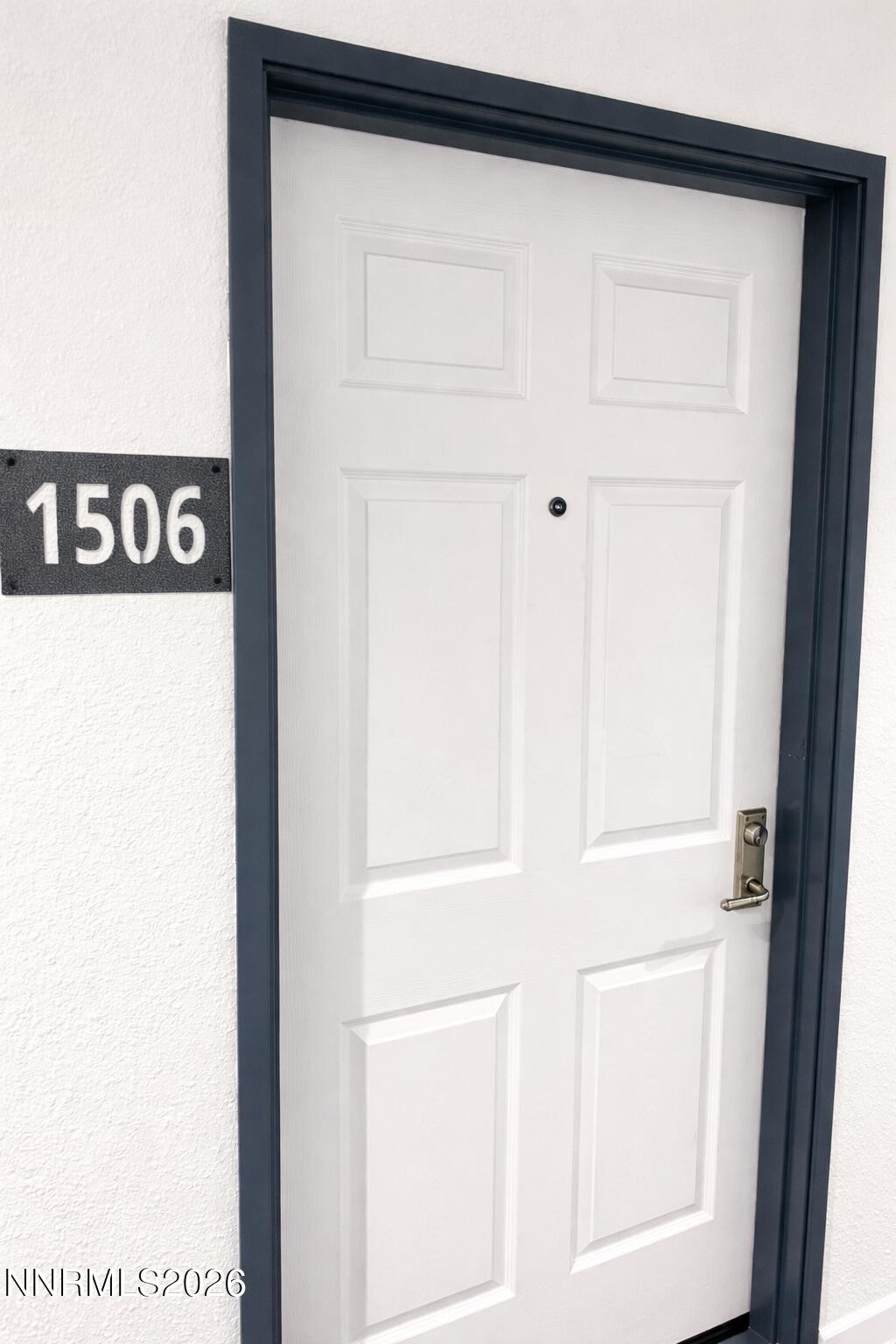 200 West 2nd Street, Unit 1506 Reno, NV 89501 - Photo 2 of 21 200 W 2nd st- outside of unit- bright