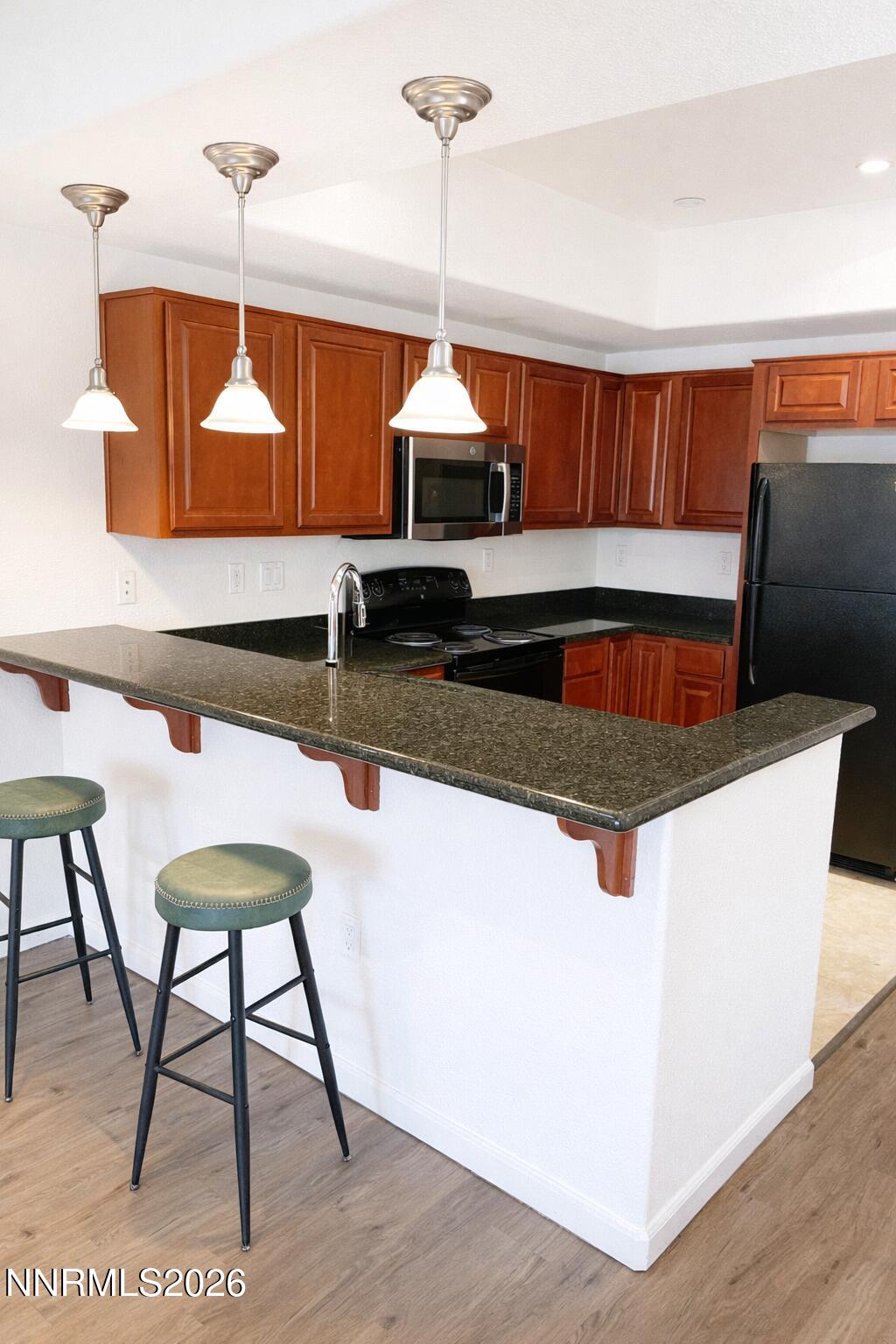 200 West 2nd Street, Unit 1506 Reno, NV 89501 - Photo 5 of 21 200 W 2nd st- kitchen- bright