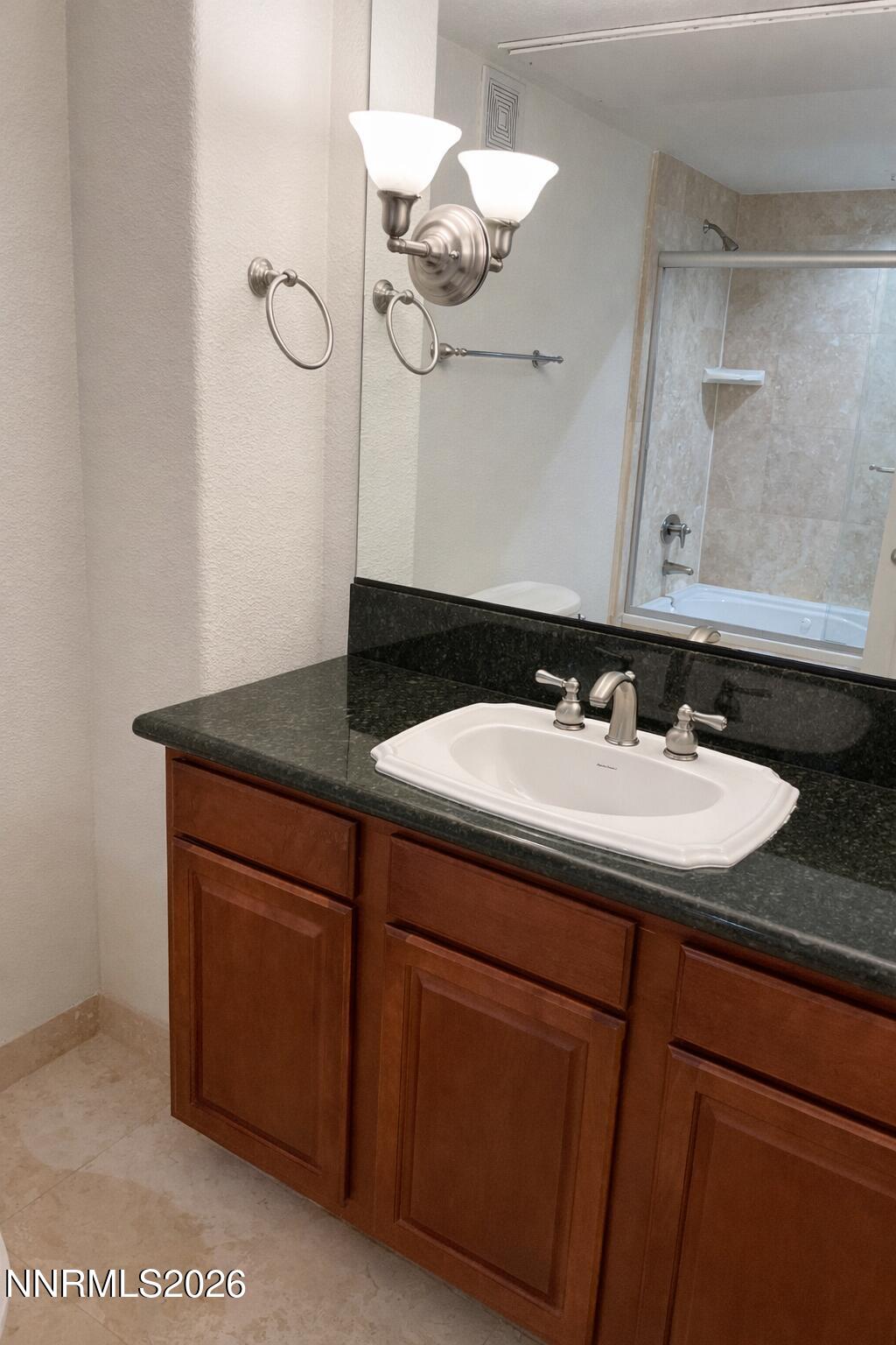 200 West 2nd Street, Unit 1506 Reno, NV 89501 - Photo 9 of 21 200 W 2nd st- bathroom sink bright