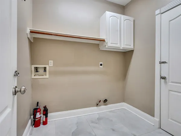 a view of a room with rack on the wall