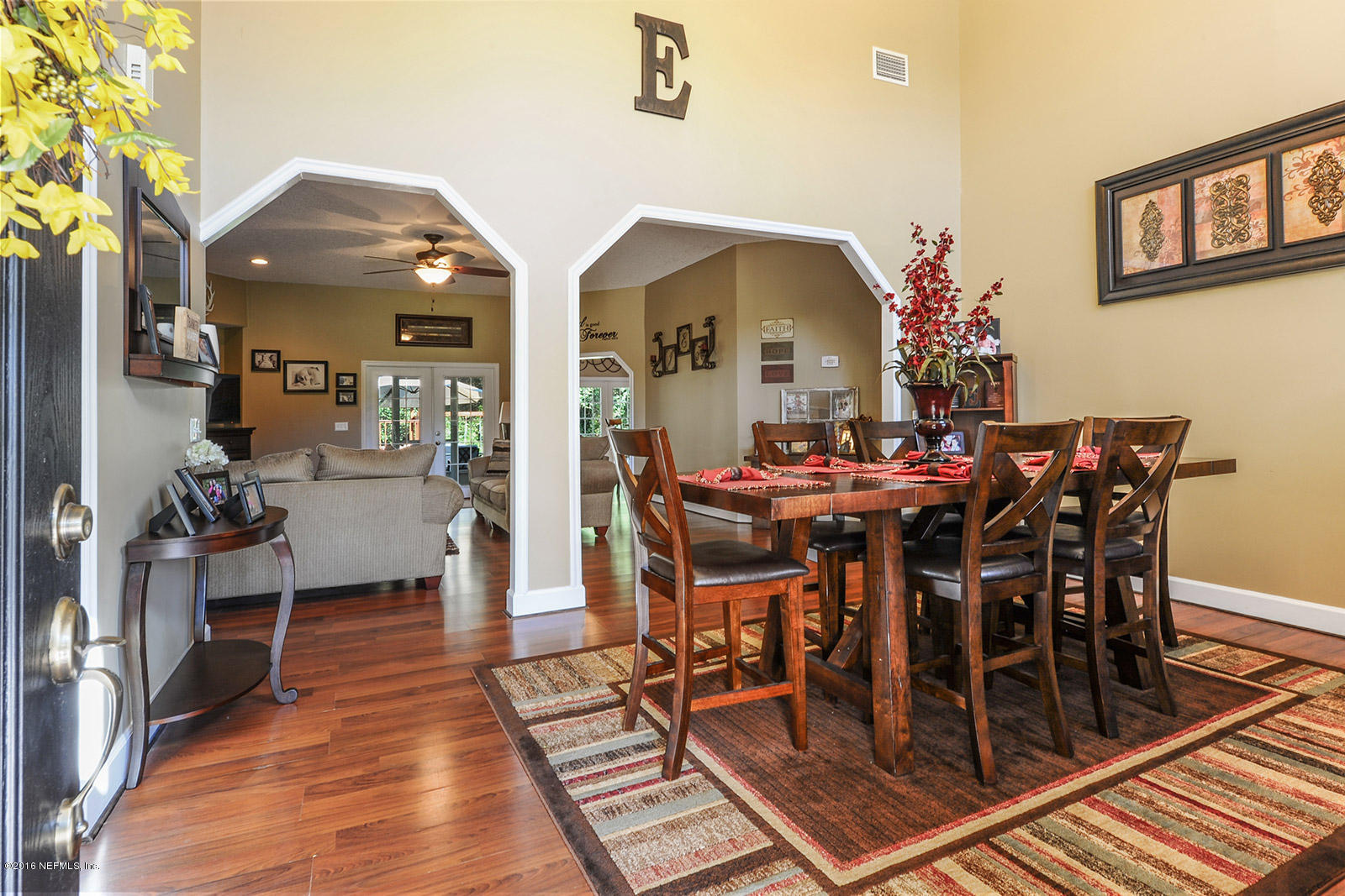 35217 Quail Road Callahan, FL 32011 - Photo 8 of 28 a view of a dining room with furniture and wooden floor