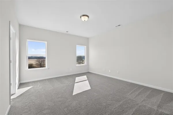 an empty room with windows