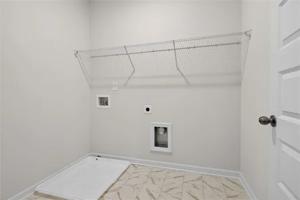 a view of a room with racks on the wall