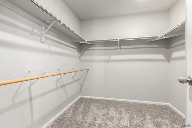 a view of an empty walk in closet
