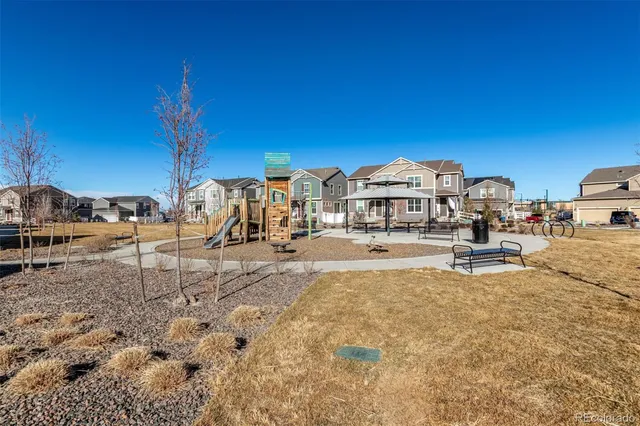a view of houses with outdoor space and seating