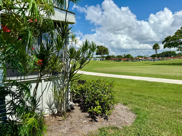 a view of a livingroom with a kitchen