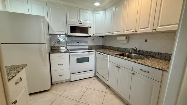 a bathroom with a shower and toilet