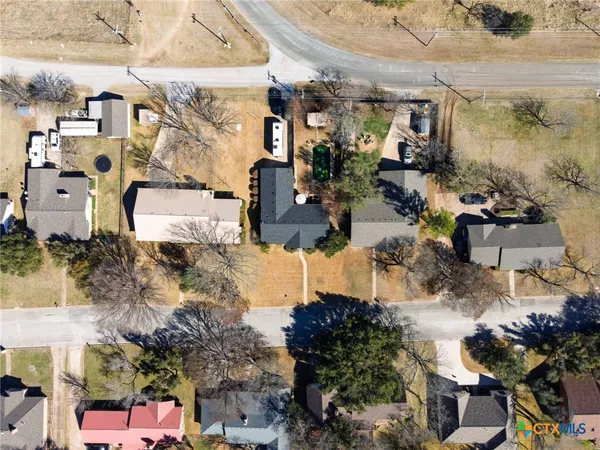an aerial view of a building with outdoor space