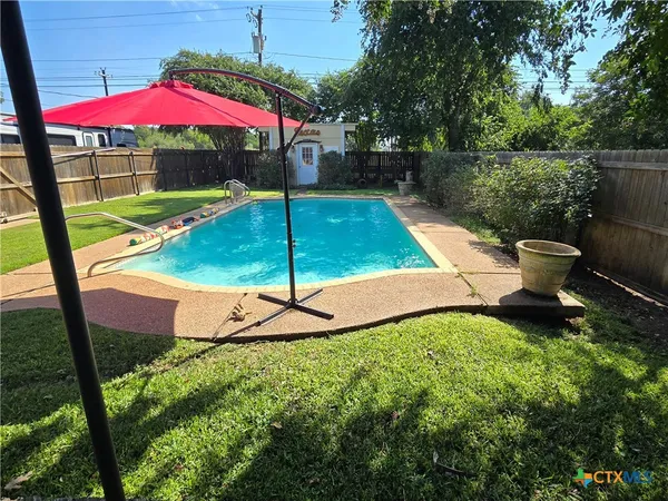 a view of an outdoor space yard patio and swimming pool