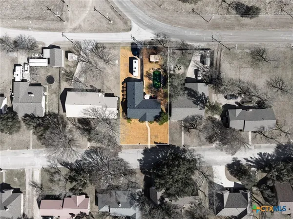 an aerial view of a building with outdoor space