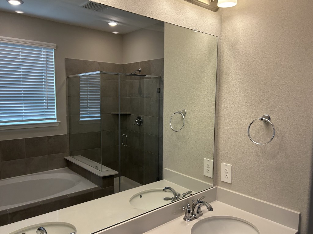 1314 Eagle Pass Drive Rosharon, TX 77583 - Photo 16 of 25 The primary bathroom features double sinks