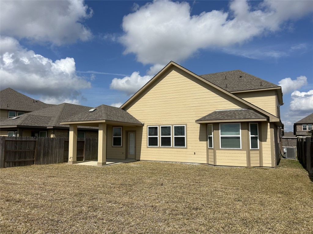 1314 Eagle Pass Drive Rosharon, TX 77583 - Photo 24 of 25 View of the spacious backyard and covered back patio
