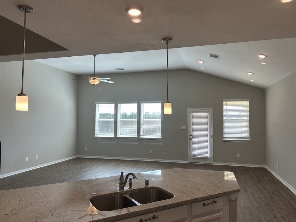 1314 Eagle Pass Drive Rosharon, TX 77583 - Photo 7 of 25 The island kitchen is flows into the den and breakfast area