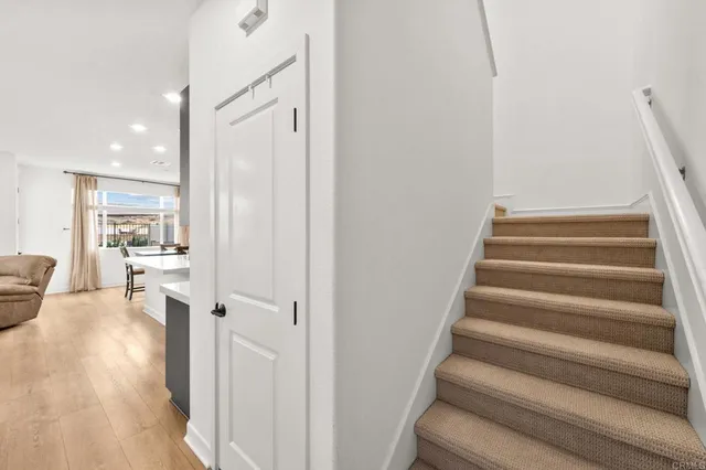 a bathroom with a double vanity sink mirror and toilet