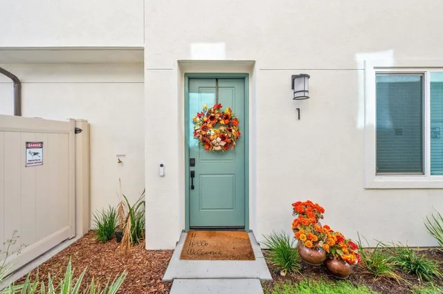 a room with toys and a potted plant