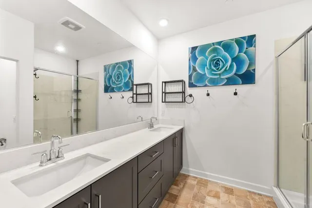 an aerial view of residential building with parking space