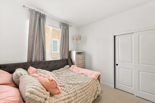 a view of a city with lawn chairs