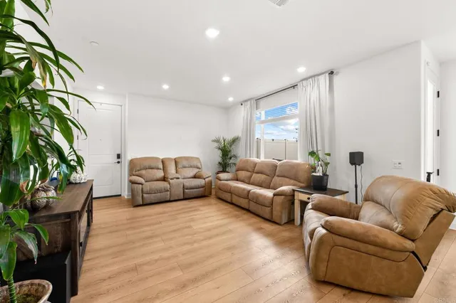 a kitchen with a sink a stove and cabinets