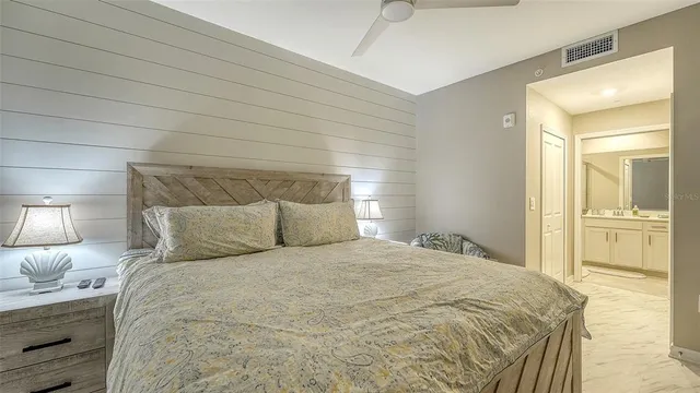 an aerial view of a house with a yard basket ball court