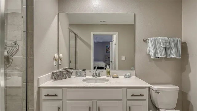 a aerial view of a house with garden space and street view