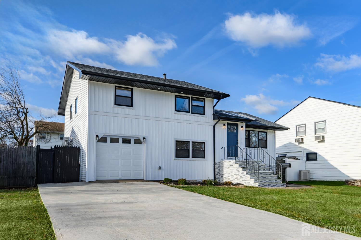 537 Ford Avenue Fords, NJ 08863 - Photo 2 of 35 a front view of a house with a yard