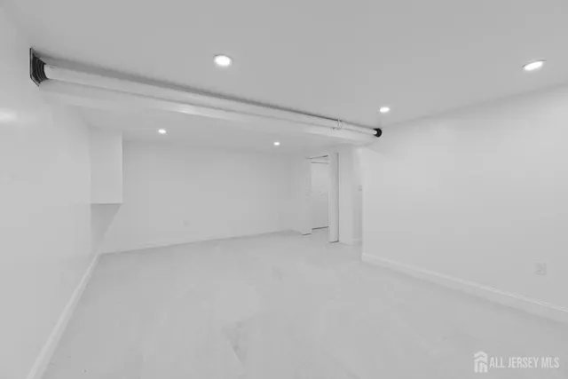 a bathroom with a toilet sink and shower