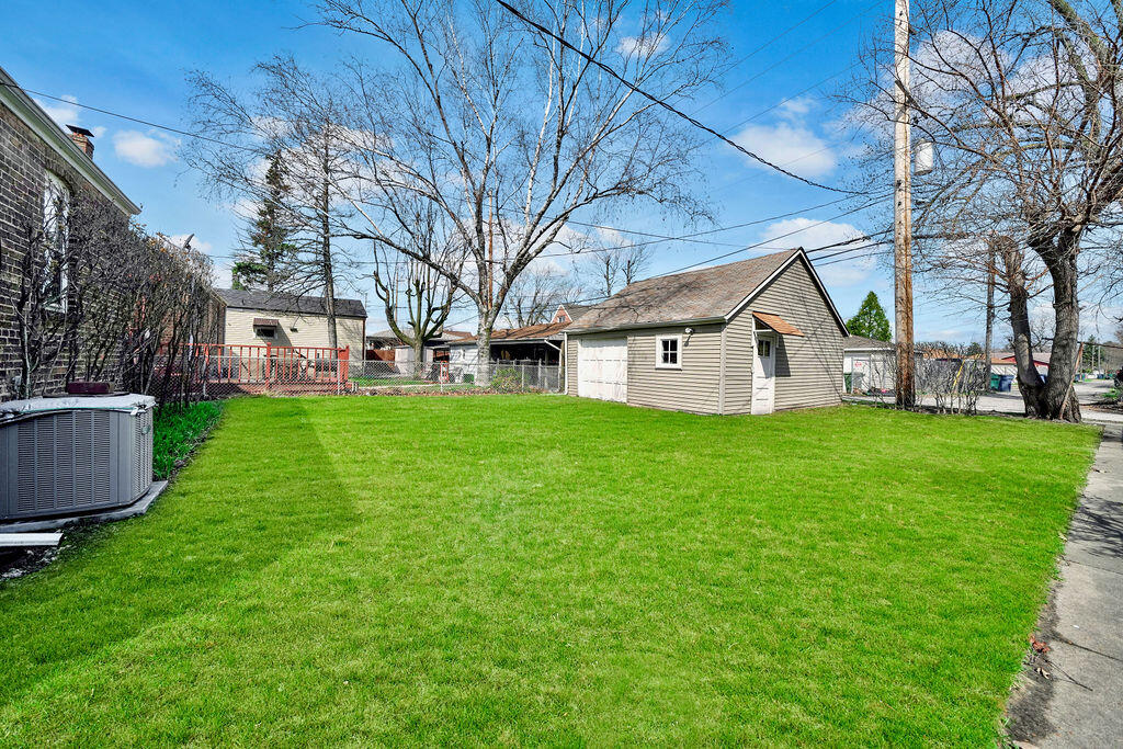 843 173rd Street Hammond, IN 46324 - Photo 17 of 18 a view of a house with a yard
