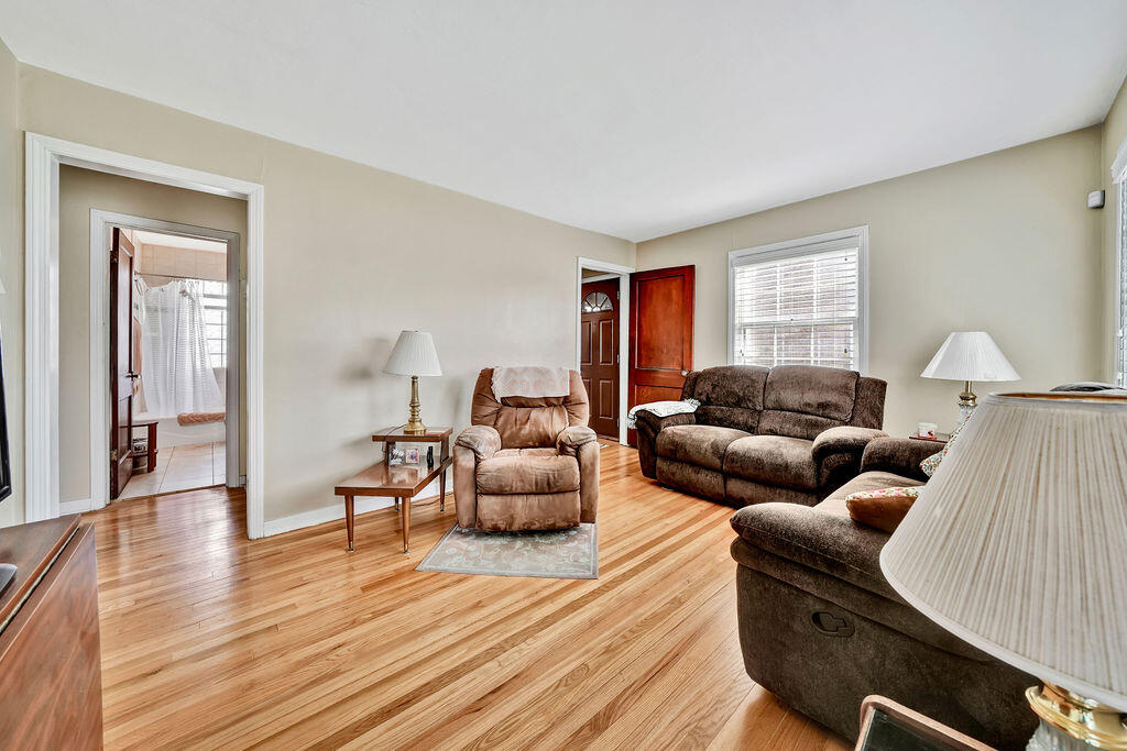 843 173rd Street Hammond, IN 46324 - Photo 5 of 18 a living room with furniture and a wooden floor