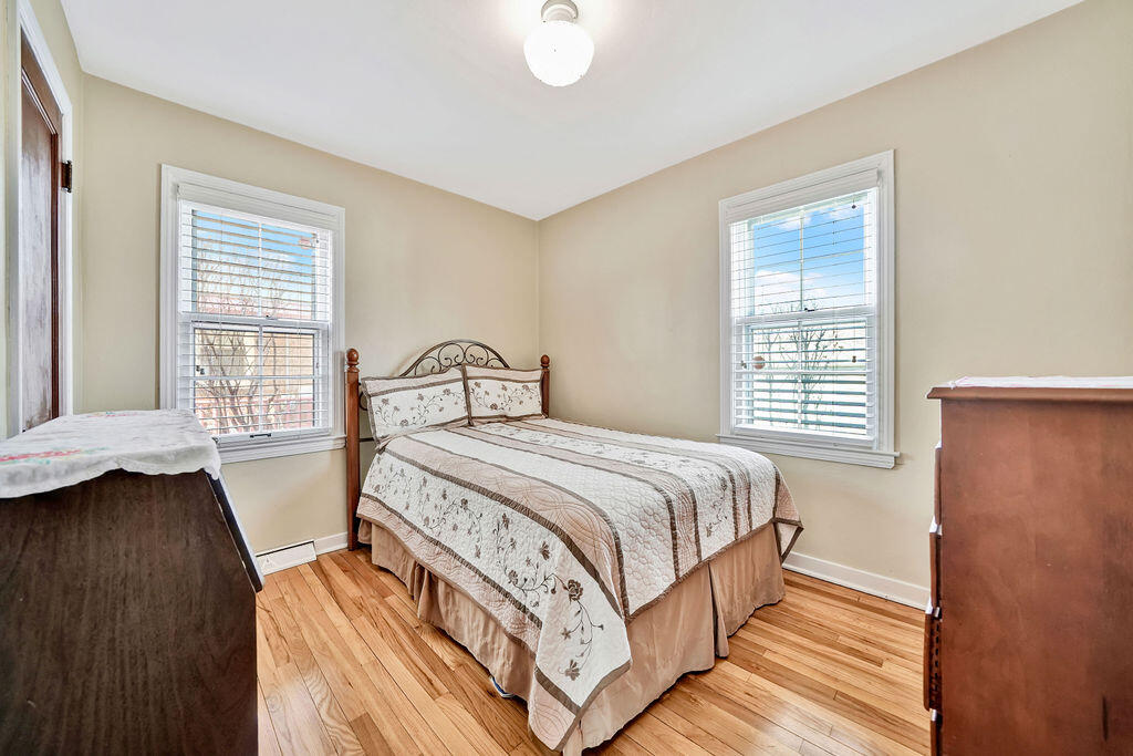843 173rd Street Hammond, IN 46324 - Photo 8 of 18 a bedroom with a bed and window