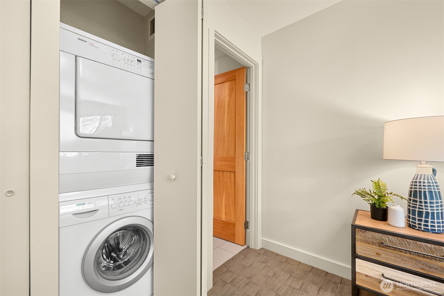 414 Boulevard, Unit 101 Bellingham, WA 98225 - Photo 26 of 32 a view of washer and dryer with bathroom in the background