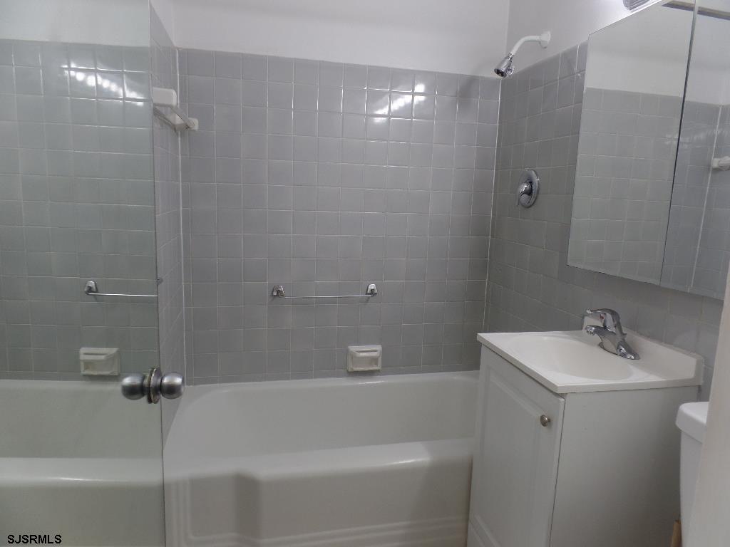 101 South Raleigh Avenue, Unit 221 Atlantic City, NJ 08401 - Photo 11 of 14 a bathroom with a shower and a sink