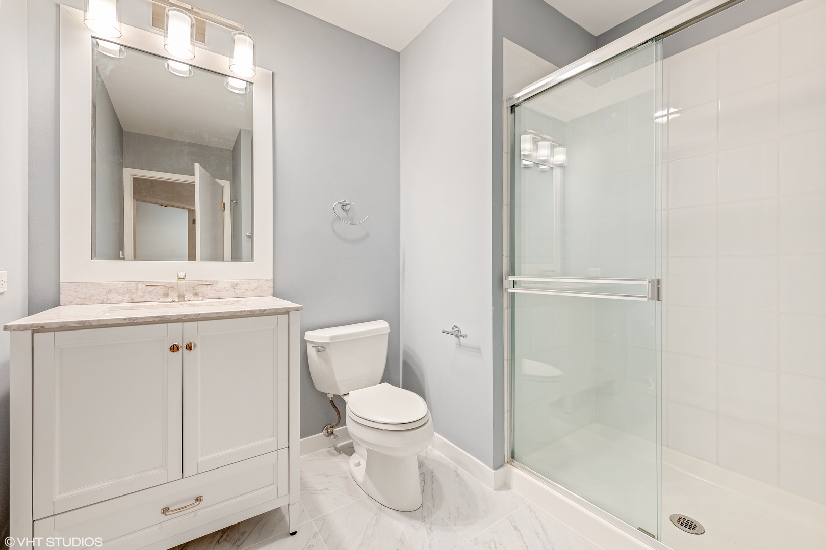 847 West Monroe Street, Unit 3A Chicago, IL 60607 - Photo 19 of 19 a bathroom with a toilet sink and shower