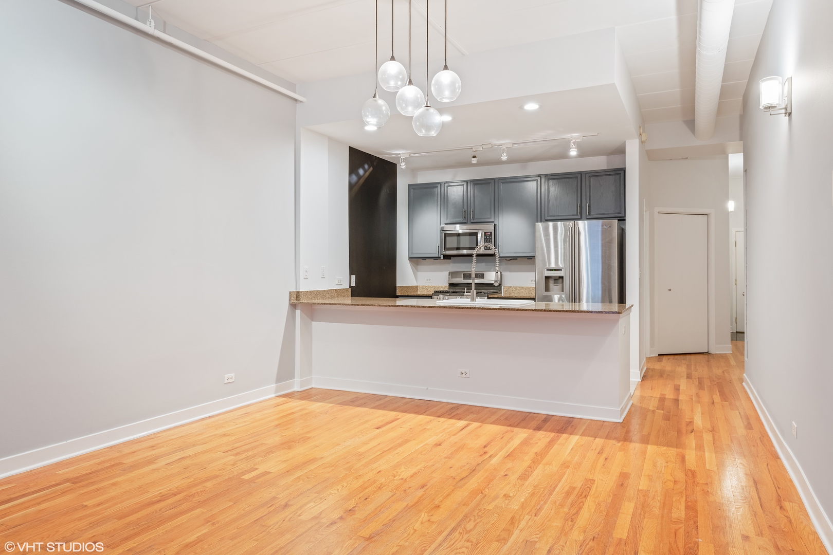 847 West Monroe Street, Unit 3A Chicago, IL 60607 - Photo 3 of 19 a view of kitchen with wooden floor