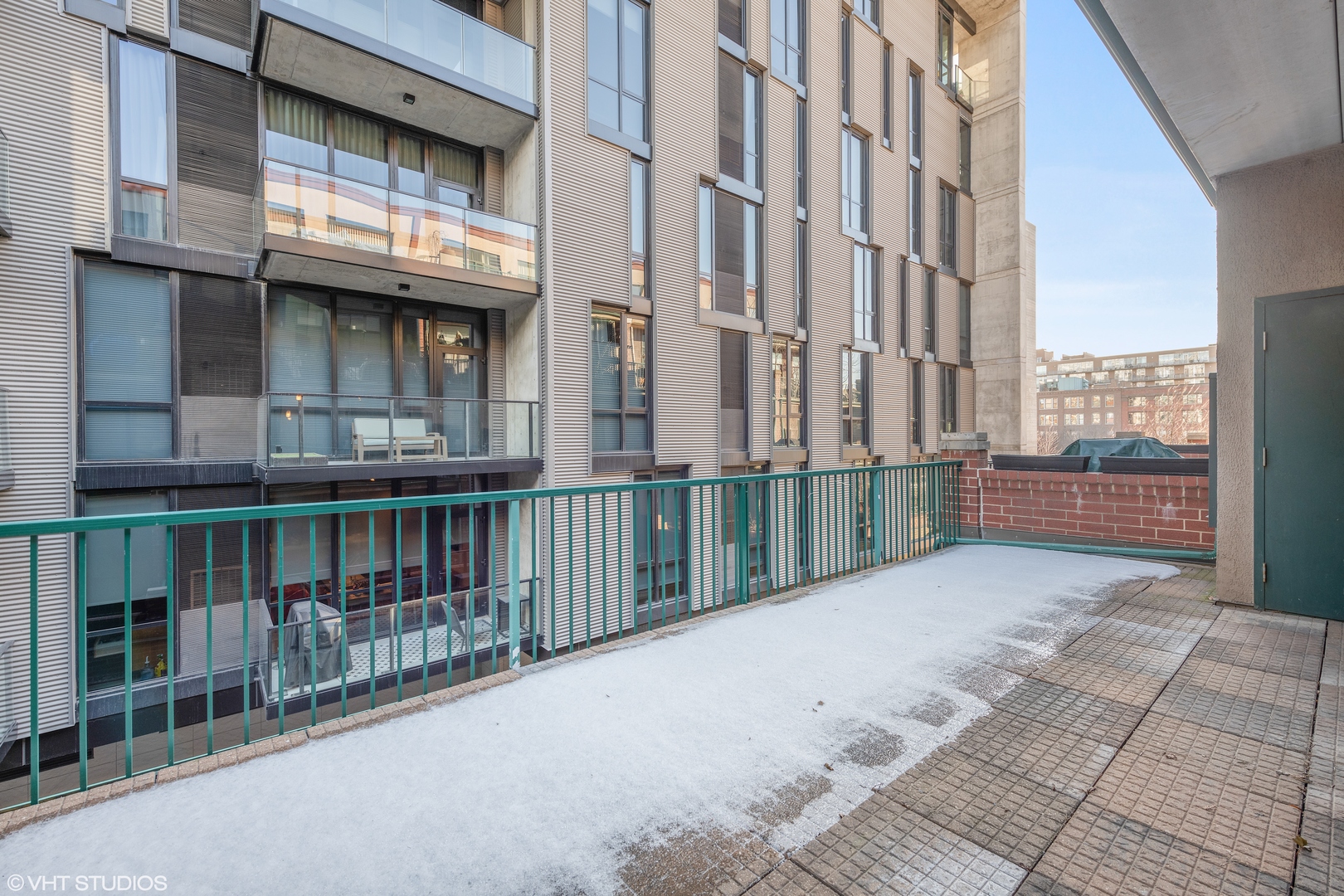 847 West Monroe Street, Unit 3A Chicago, IL 60607 - Photo 9 of 19 a view of a balcony with a floor to ceiling window