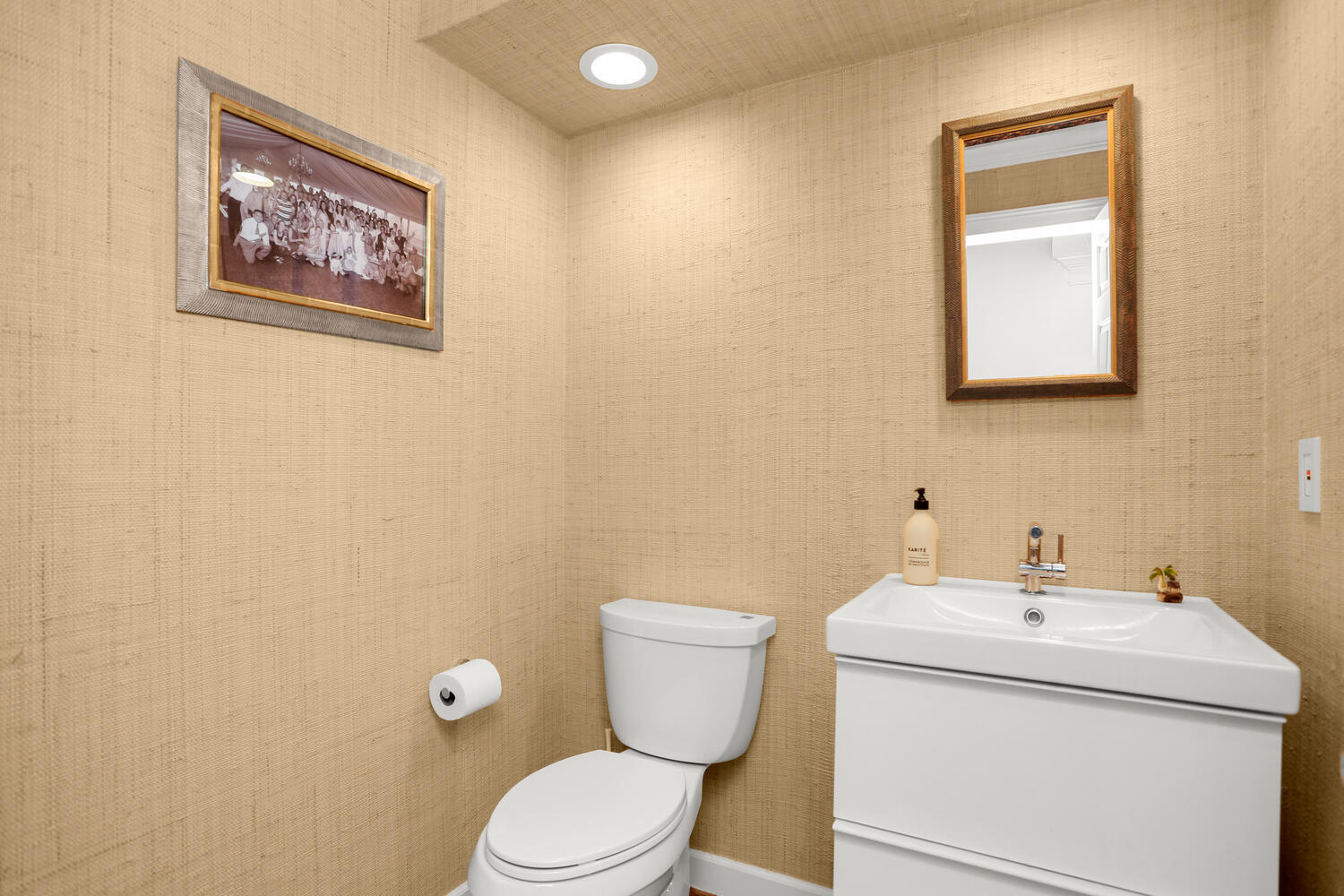 3 Pine Brook Lane Darien, CT 06820 - Photo 12 of 26 a bathroom with a toilet sink and mirror