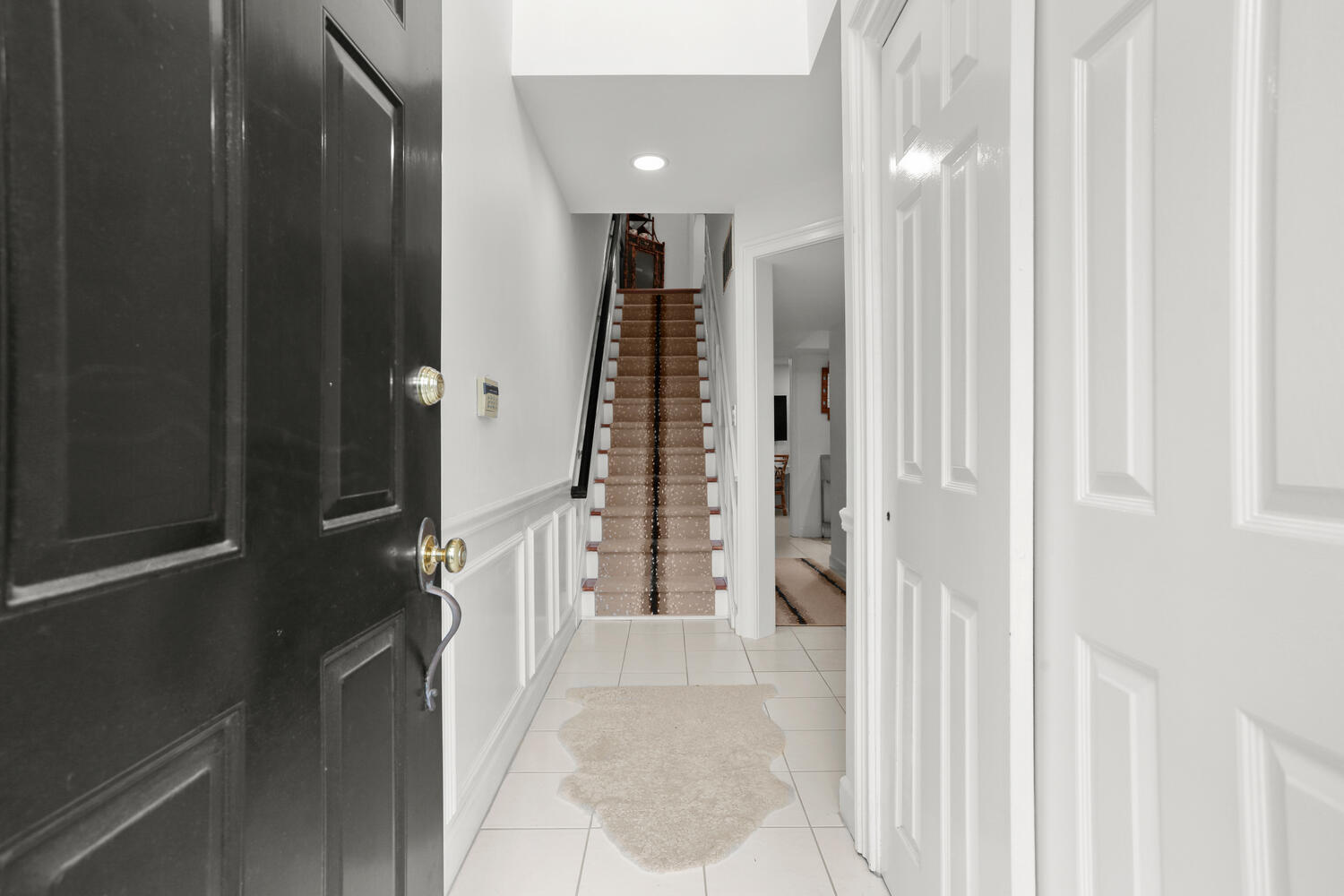 3 Pine Brook Lane Darien, CT 06820 - Photo 2 of 26 a view of an entryway with staircase